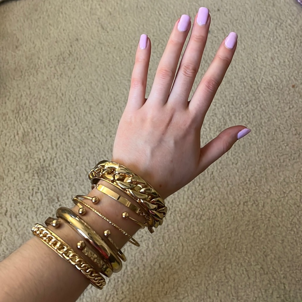 Gold colored chunky bracelets (set for both wrists)